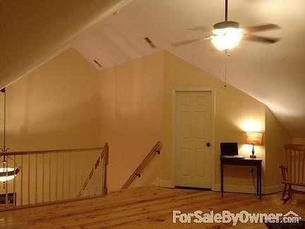 loft above kitchen
						:
						With small guest/office/storage room
Additional storage 
2x6 T n G pine floors