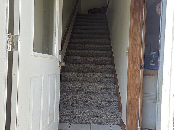 Entrance is accessible thru garage or this outside door.