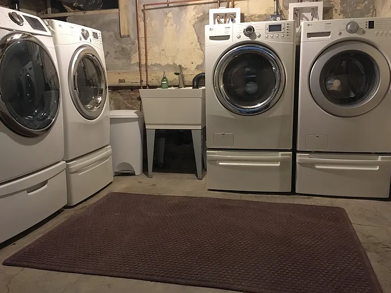 Free laundry and secure storage in basement