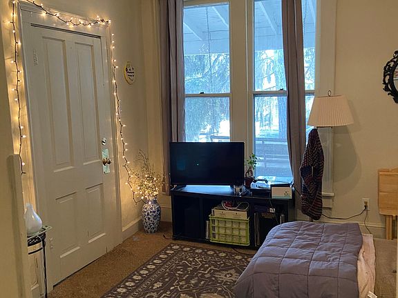 Living room which accesses front porch