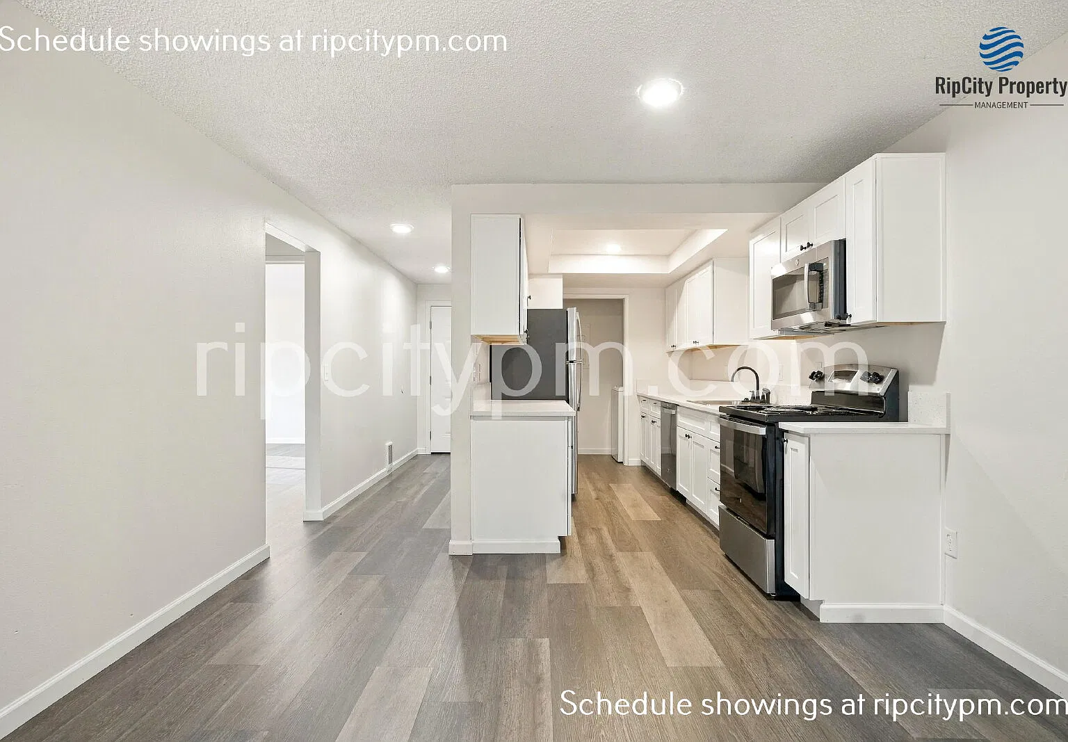 Fully Remodeled 2-Bedroom Duplex with Huge Fenced Yard, Covered Patio & Garage — Photo 2
