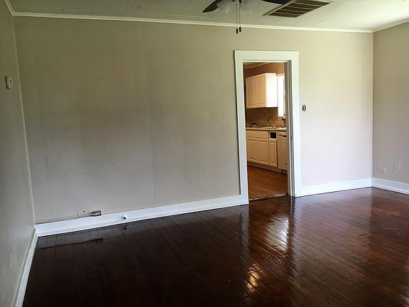 Living Room looking into kitchen, hardwood floors, ceiling
