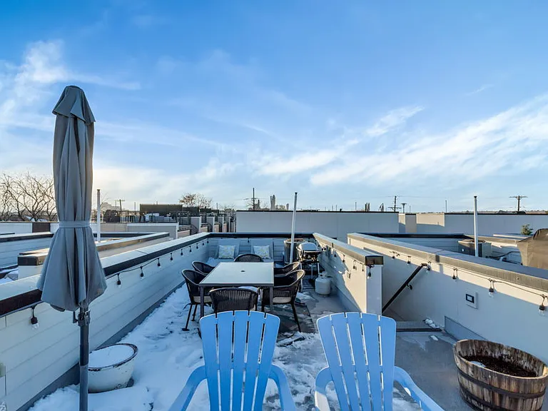 Rooftop with mountain and city views