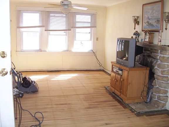 Living room after sanding floors Original to house
