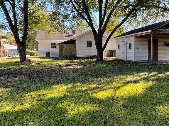 Back of house and yard. Shed is off limits as mentioned.