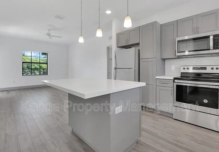 630 NE 14th Ct #205 — Photo 1