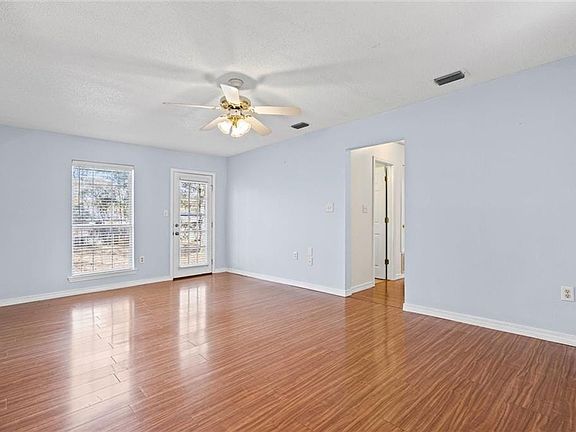 The family room overlooks the spacious backyard.