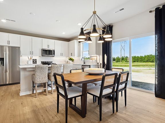 Dining Room and Bright White Kitchen
