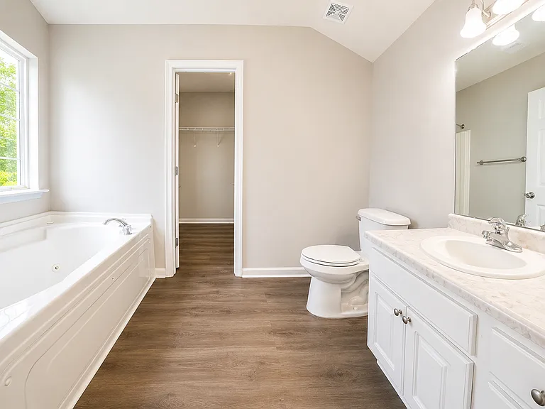 Master Bedroom and Walking Closet
Bathtub and Standing Shower