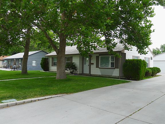 Driveway, garage, and porch.