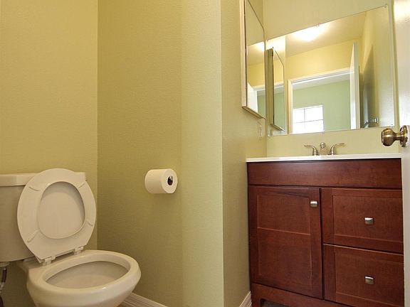 Bathroom 1 with new toilet, sink, faucet and tile floor