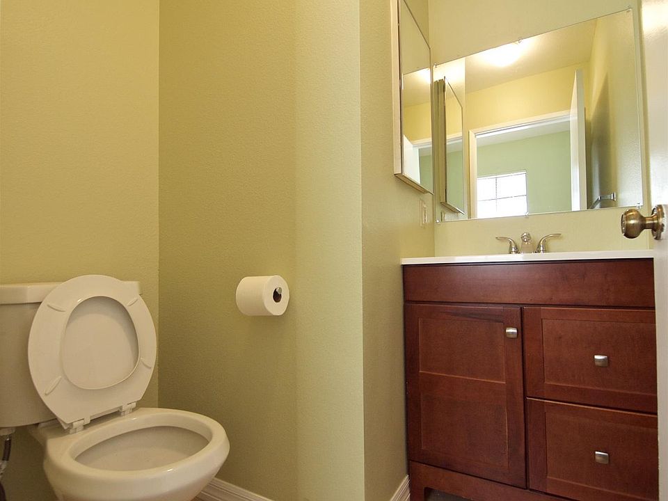 Bathroom 1 with new toilet, sink, faucet and tile floor