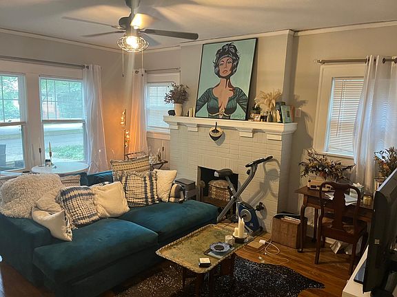 Front Living Room with decorative fireplace & mantle.