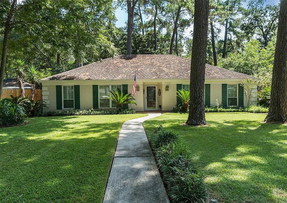 If you are looking for a stately, single story home in Champions full of character...this is IT!