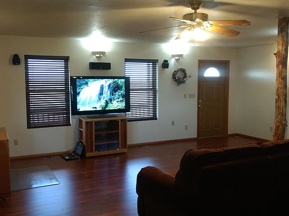 Living room is wired for & has surround sound speakers.