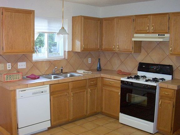 Updated kitchen w/ceramic tile counter-tops