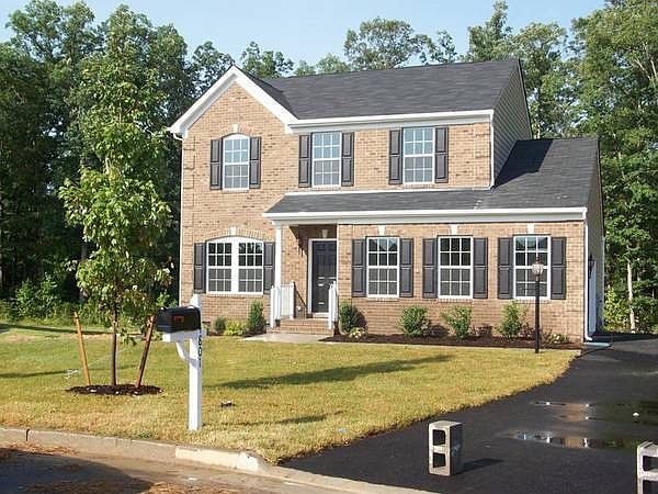 Front Elevation
						:
						Uniquely designed full brick front with brick rowlocks and quoins!