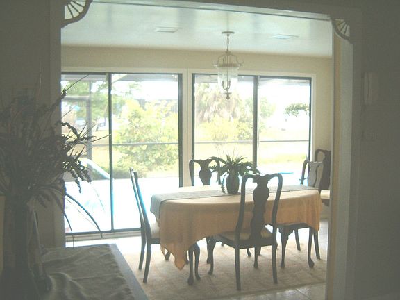 Dining room or sun room looking on to pool