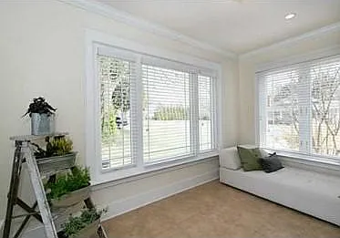 Sunroom on the other side of living room/seating area