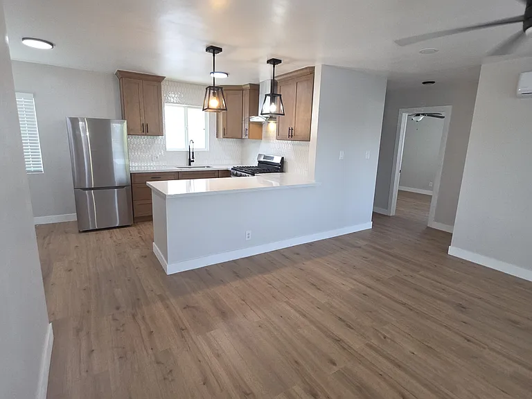 Front room with view to open kitchen