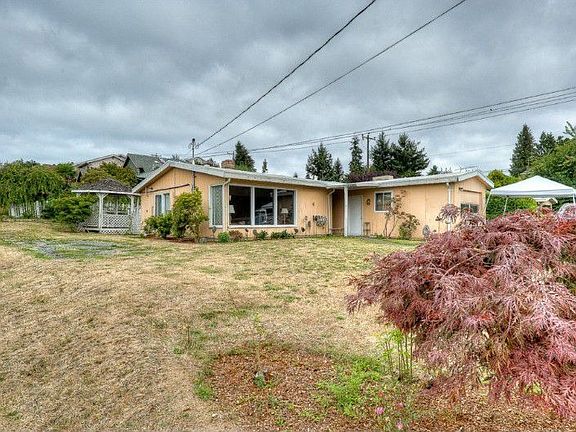 Welcome to 4626 SW Hanford St on the corner of 47th Ave SW & SW Hanford St. Notice the RV parking wi