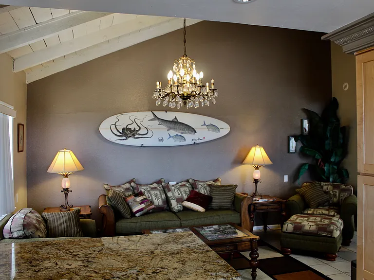 Second view of family room from kitchen with High ceilings.