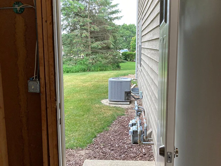 Door from garage to back yard.