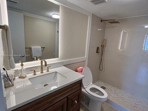 5th image of 250 180th Dr APT 355