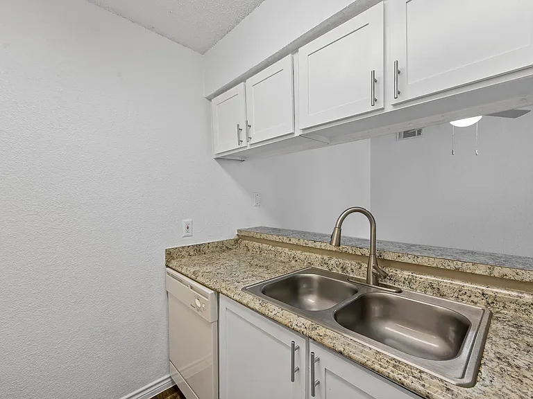 Updated kitchen with beautiful countertops