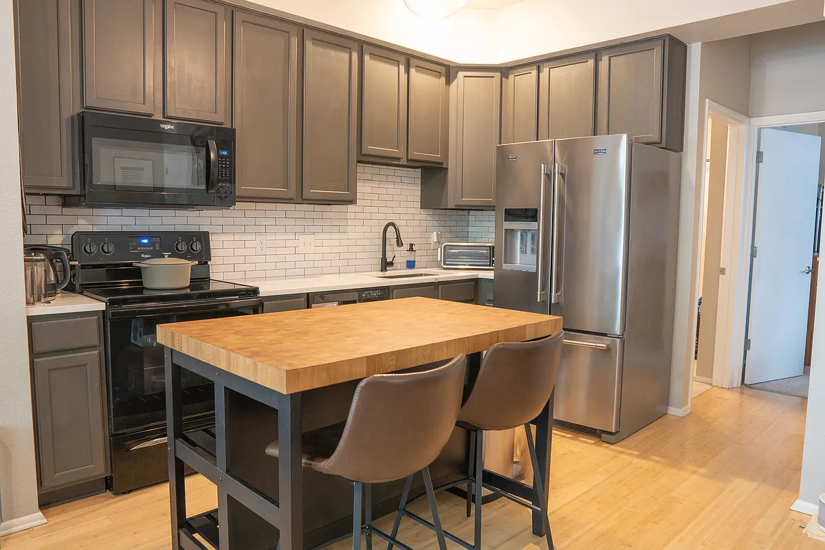 Building Photo - 3149 Blake St #103