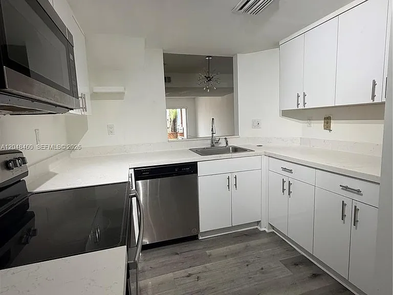 1175 NW 123rd Pl #210 — Photo 1