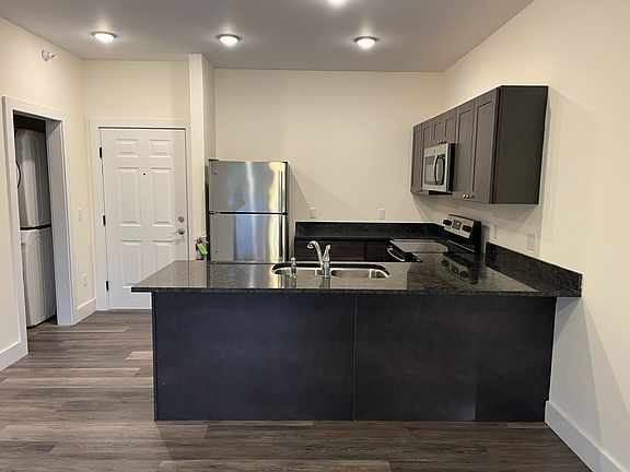Kitchen view with breakfast bar