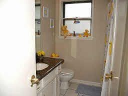 The second bath is recently painted with neutral colors. Recently installed co