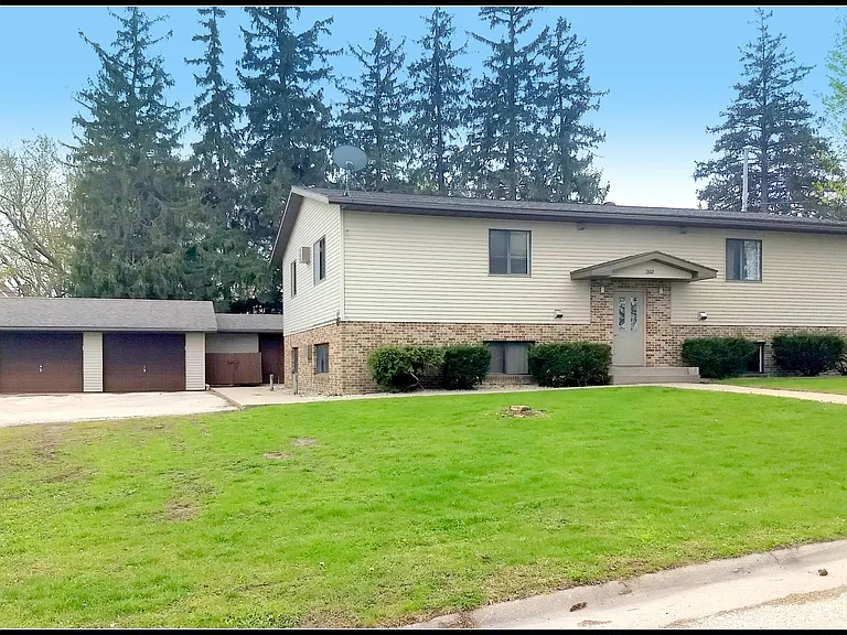 4 unit apartment building. Lower unit apartment available with garage included.
