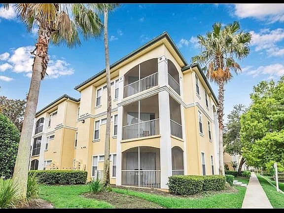 Building view. Second floor screened balcony shown.