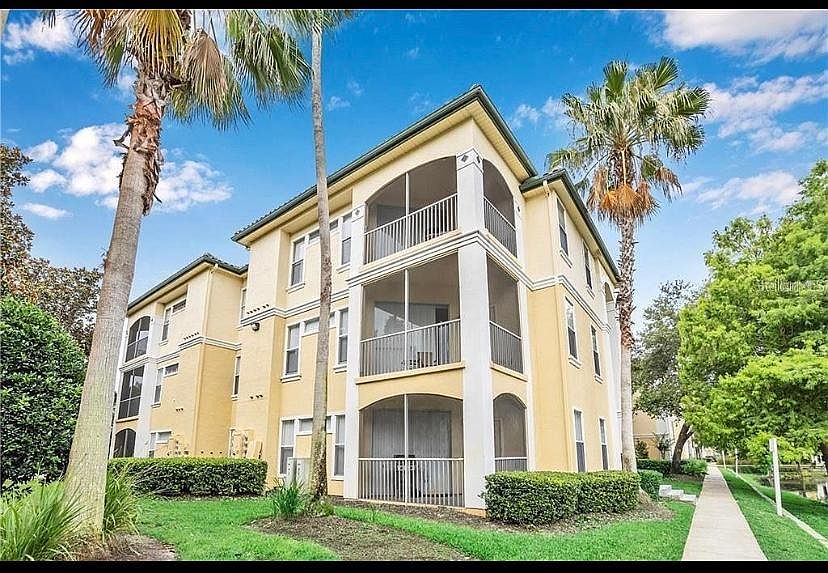 Building view. Second floor screened balcony shown.