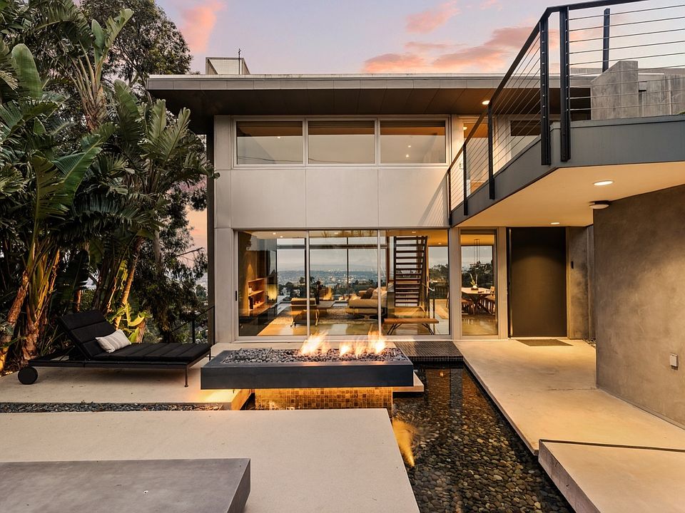 Modern Japanese-inspired Zen residence in the Hollywood Hills, featuring seamless indoor-outdoor living and sweeping canyon views.