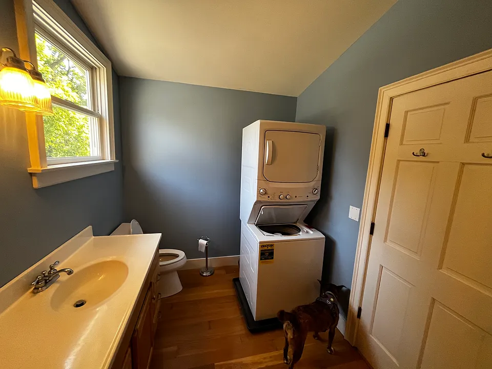 larger of the two bathrooms has the w/d in it