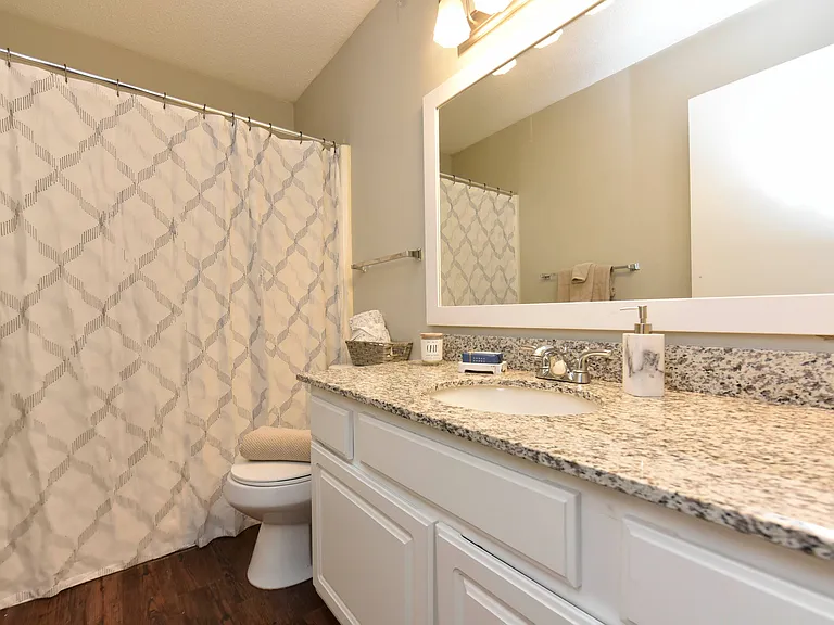 Spacious Bathroom + Granite Counters
