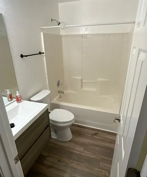 Picture of other unit. Flooring in unit for rent is plank shaped tile.