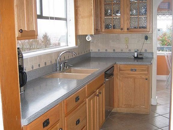 kitchen w/ corian and new cabinets