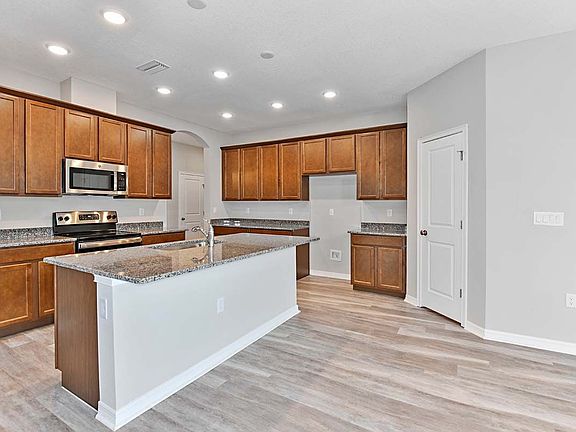 Sandhill home plan new construction home kitchen at BridgeWater by William Ryan Homes Tampa