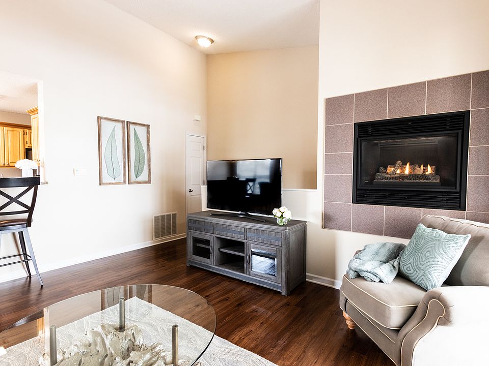 Alluring Fireplace & Vaulted Ceilings