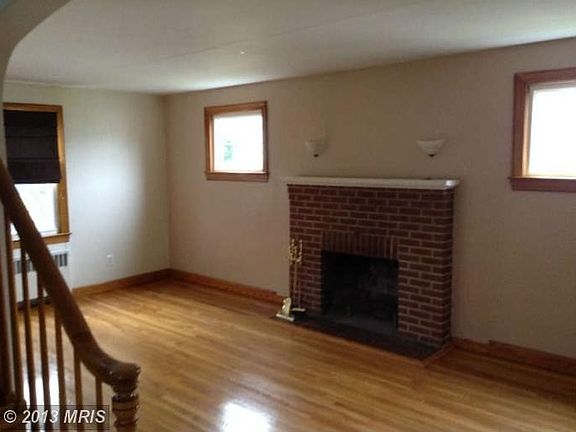 Living Area with Wood Burning Fireplace