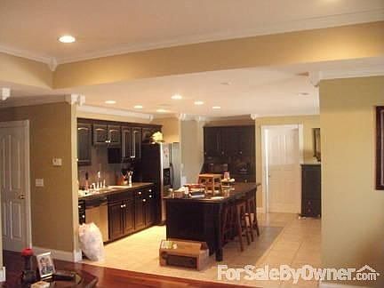 Dining/Kitchen : Spacious Kitchen and Dining ..Crown Moulding and large tiled flooring..