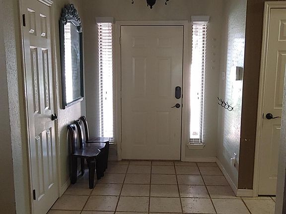 Entry, coat closet and storage closet.