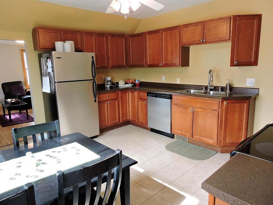 Eat-in kitchen with plenty of counter space and a dishwasher.