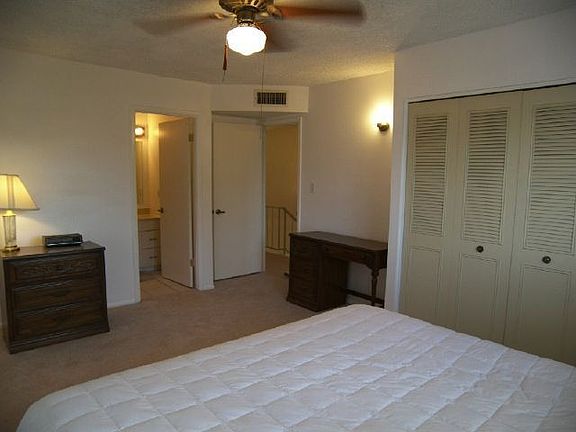 Configure the four upstairs bedrooms to suit yourself: Four bedrooms, three plus office, or two split living spaces. What works for you? All the rooms are spacious with new carpet, ceiling fans and paint.