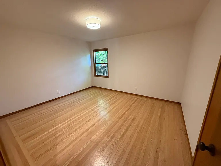 Bedroom #2 has one window and a single door closet.