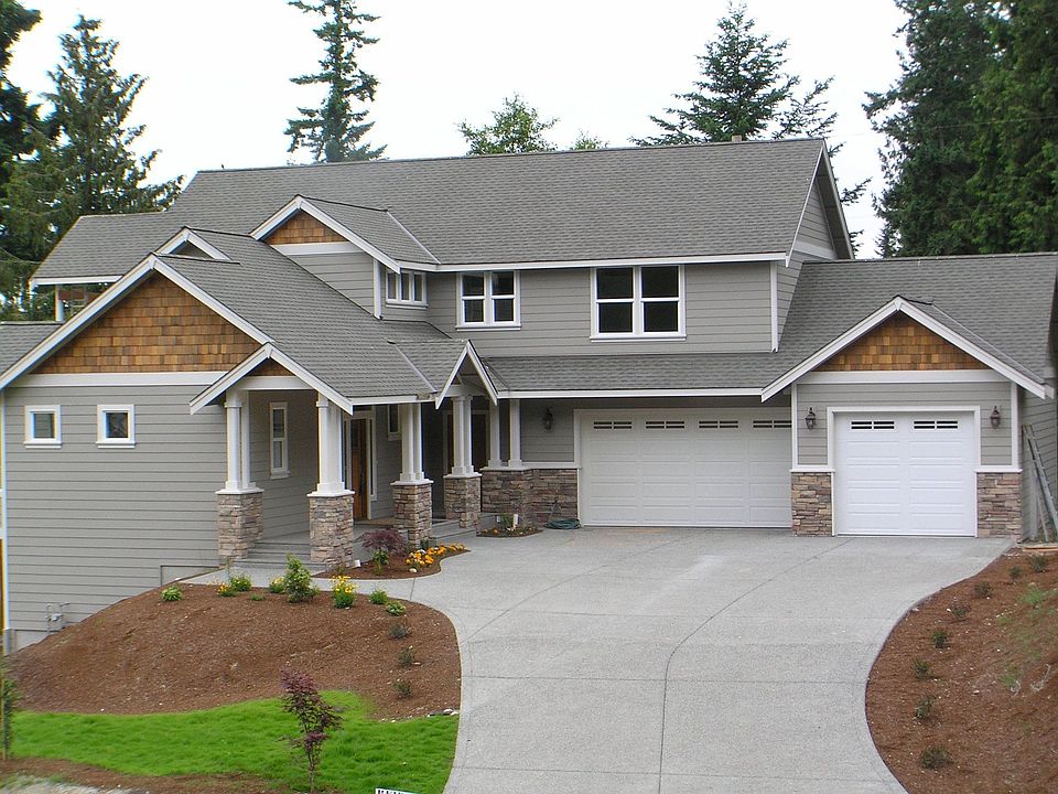 Front of the home, 3 car garage to your right, hot and cold water tap outside.